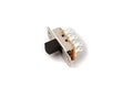 Metal slide switch with black plastic slider and four solder lug terminals on the back.