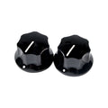 Two black plastic skirted rotary knobs with white indicator lines on a white background.