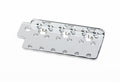 Chrome metal guitar bridge plate with multiple mounting holes on a white background.