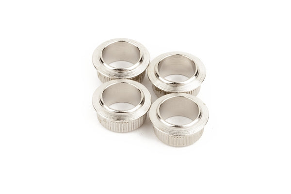 Four silver-colored metal bushings arranged in two rows on a white background.