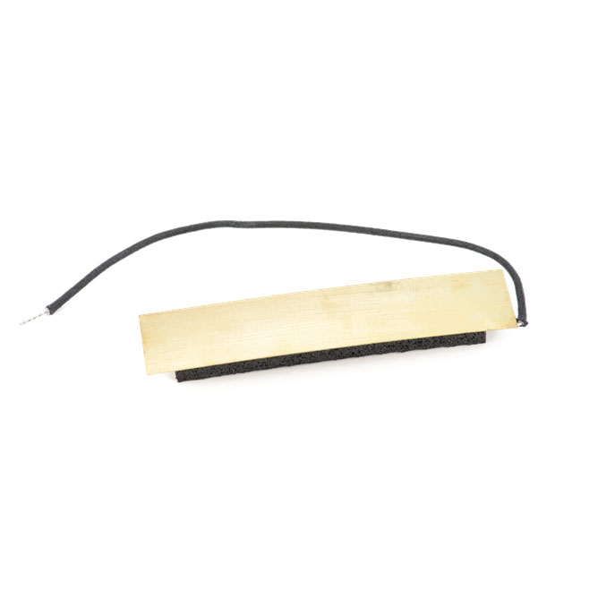 Gold-colored metal shield assembly with black foam backing and an attached black ground wire.