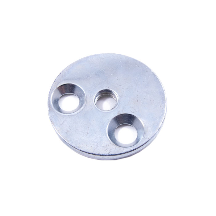 Round metallic disc with three recessed holes on a white background.