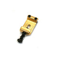 Gold-colored metal guitar bridge saddle with black screw on a white background.