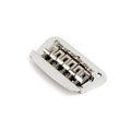 Chrome metal bridge assembly for a guitar with adjustable saddles and mounting hole.