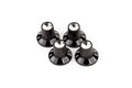Four black amplifier knobs with silver tops and white numbering around the base arranged on white background.
