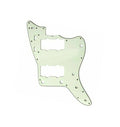 Light green guitar pickguard with mounting holes and cutouts on a white background.