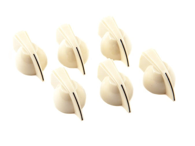 Seven cream-colored rotary amplifier knobs with black indicator lines arranged on a white background.