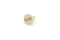 A single aged white plastic volume knob cap with brown text on a white background.