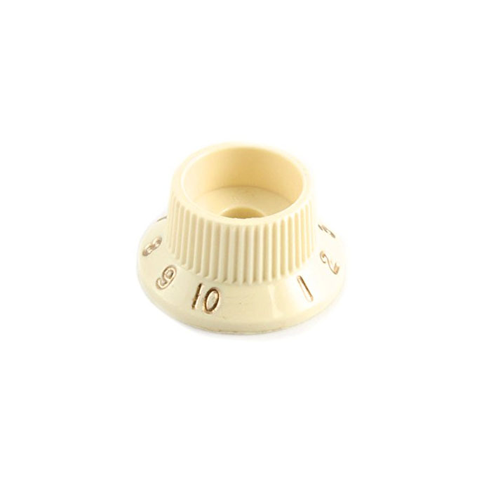 Aged white control knob with numbers 1 to 10 arranged around its base.