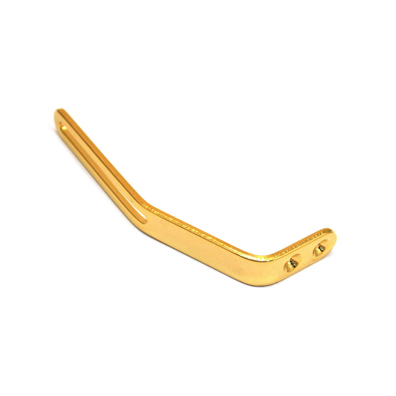 Gold-colored metal L-shaped mounting bracket with two screws on one end.