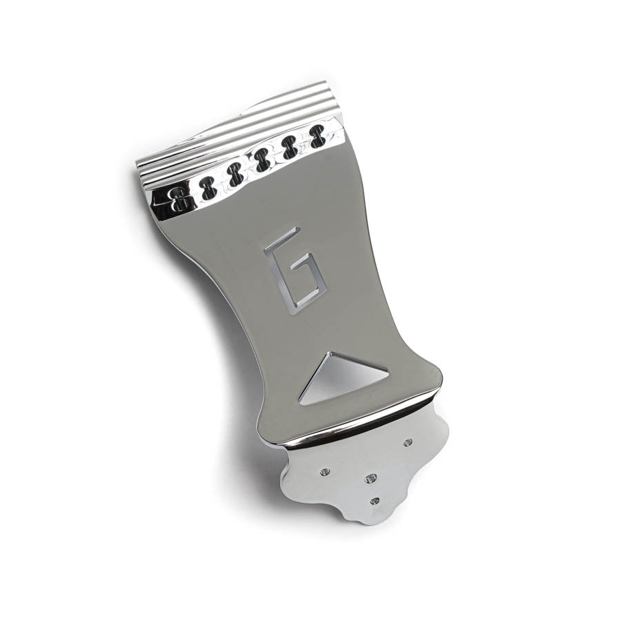 Chrome metal guitar tailpiece with a raised letter G and a triangular cutout.