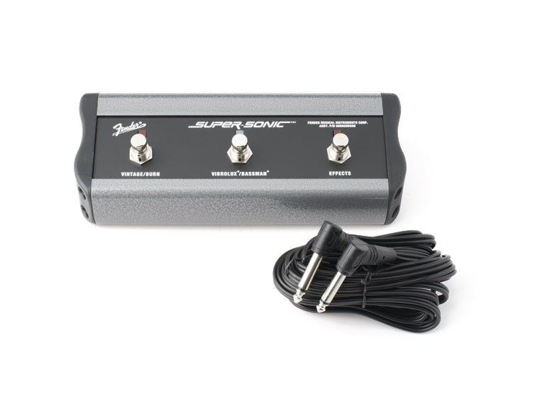 Black and gray Fender footswitch with three buttons and a cable with two right-angle 1/4 inch plugs.