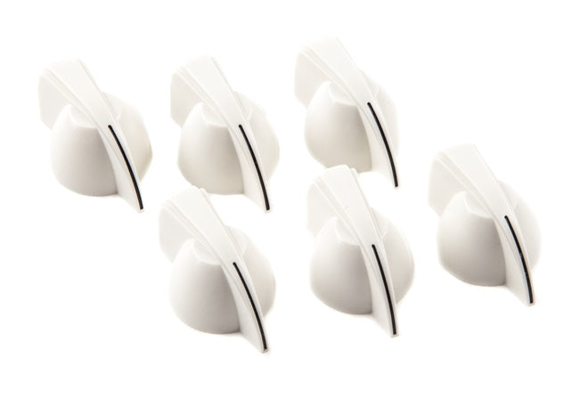 Six white plastic control knobs with a black indicator line arranged on a white background.