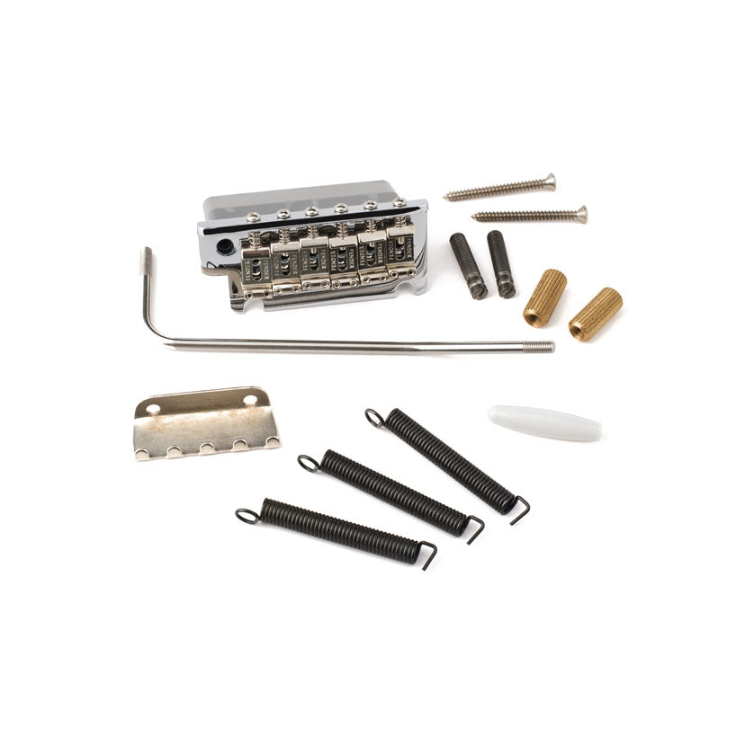 Chrome guitar tremolo bridge assembly with springs, screws, claw, arm, barrel nuts, and white plastic tip.