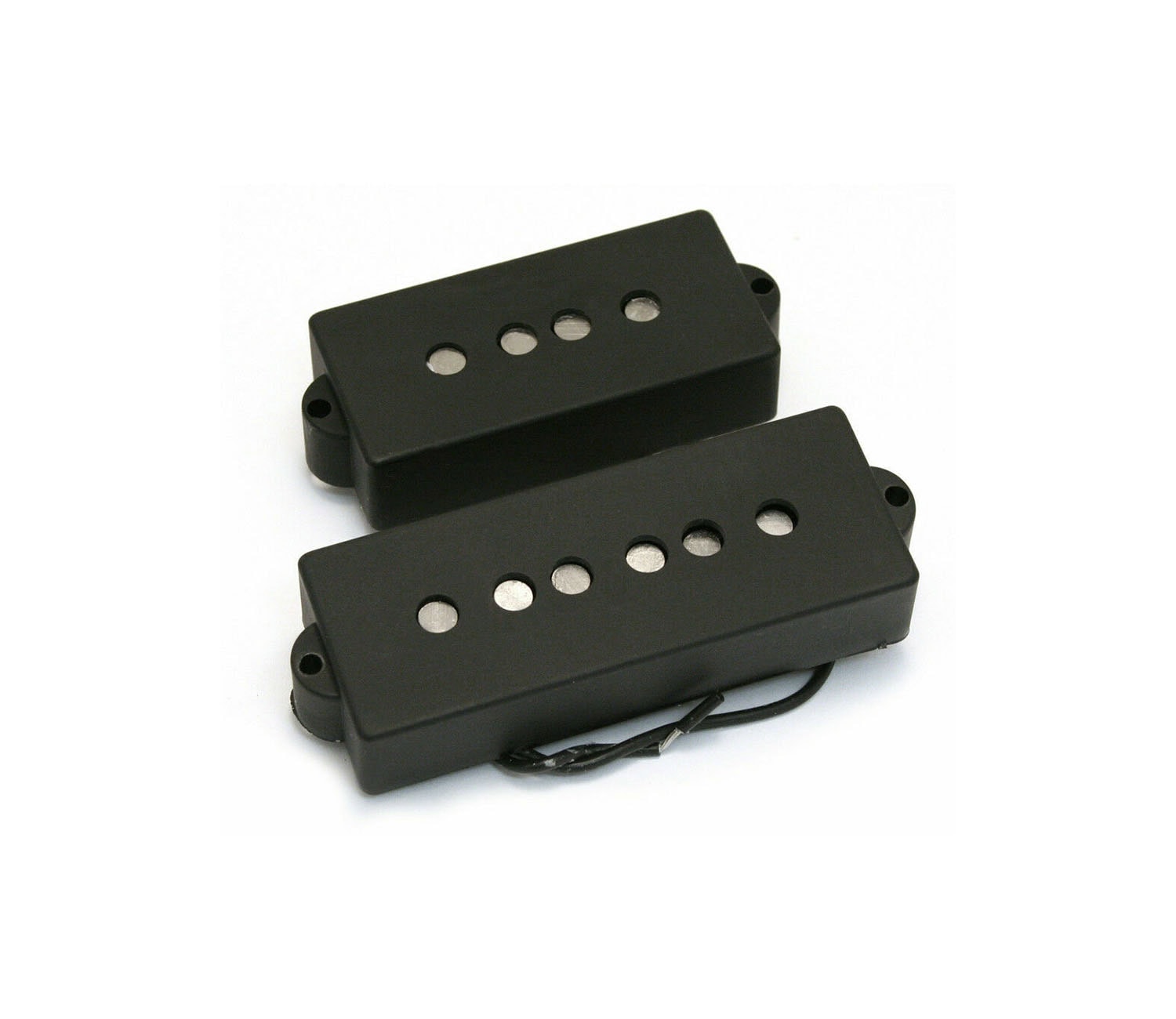 Two black electric bass guitar pickups with exposed magnets and attached wires on white background.