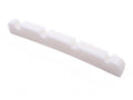 White pre-slotted string nut for a bass guitar with four string slots, isolated on white background.