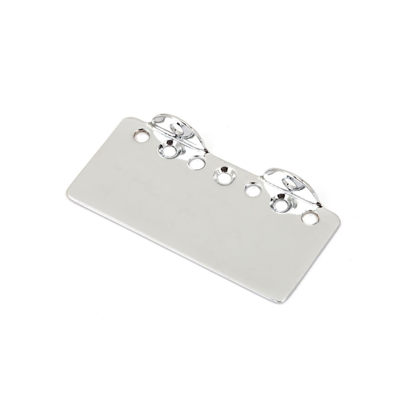 A rectangular silver metal plate with multiple round holes and two raised tabs on one edge.