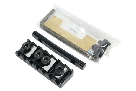 Black metal locking nut with three adjustable clamps alongside a metal rod and a hardware kit in a plastic bag.