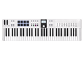 White MIDI keyboard controller with 61 keys, 8 pads, multiple faders, knobs, buttons, and a small display screen.