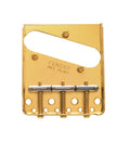 Gold metal guitar bridge plate with three adjustable saddles and screws.