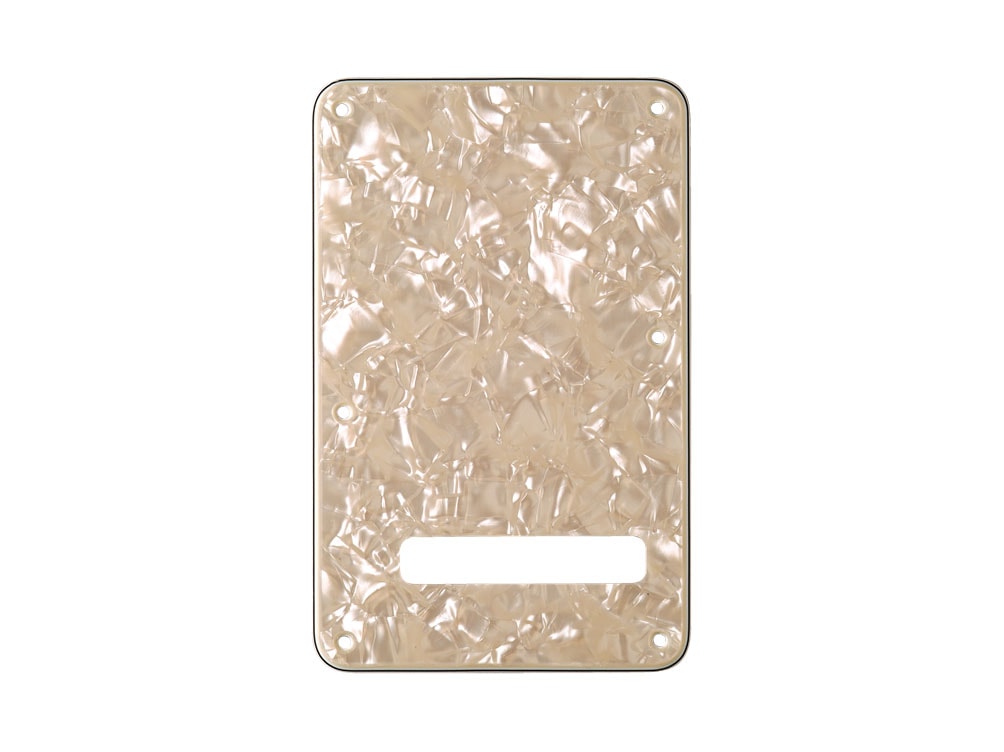 Aged white 4-ply plastic tremolo backplate for electric guitar with rectangular cutout and six mounting holes.