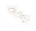 Three white rotary control knobs labeled Volume and Tone with gold numbering from 1 to 10.