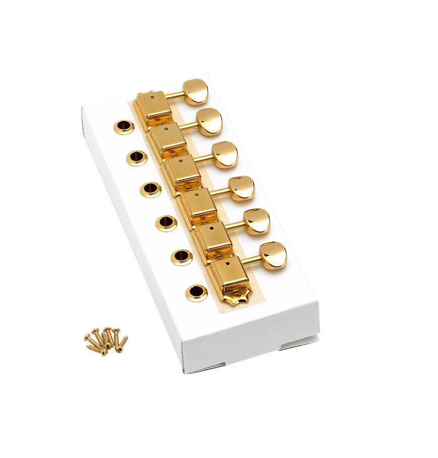 Set of six gold tuning machines for a guitar with mounting screws and bushings on white packaging.