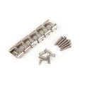 Metal guitar saddles with springs and screws on a white background.