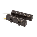 Black electric bass pickups with silver pole pieces and wire leads labeled Noiseless.