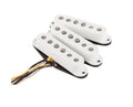 Three white single-coil guitar pickups with attached wire leads on a white background.