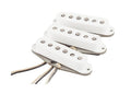 Three white single coil pickups for an electric guitar with wires attached, displayed on a white background.