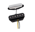 Two electric guitar pickups, one covered in chrome and one black with six pole pieces and attached wires.