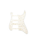 Aged white pearl plastic pickguard with 11 holes and slots for guitar pickups, in a typical Stratocaster shape.