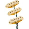 Three cream-colored single-coil electric guitar pickups with attached multi-colored wires.