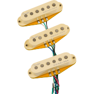 Three cream-colored single-coil electric guitar pickups with attached multi-colored wires.