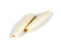Two aged-white plastic tremolo arm tips placed on a white surface.