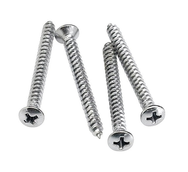Four silver metal screws with Phillips heads arranged on a white background.