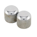 Two silver metallic dome knobs with textured sides on a white background.