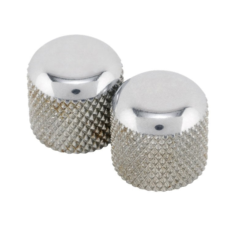 Two silver metallic dome knobs with textured sides on a white background.