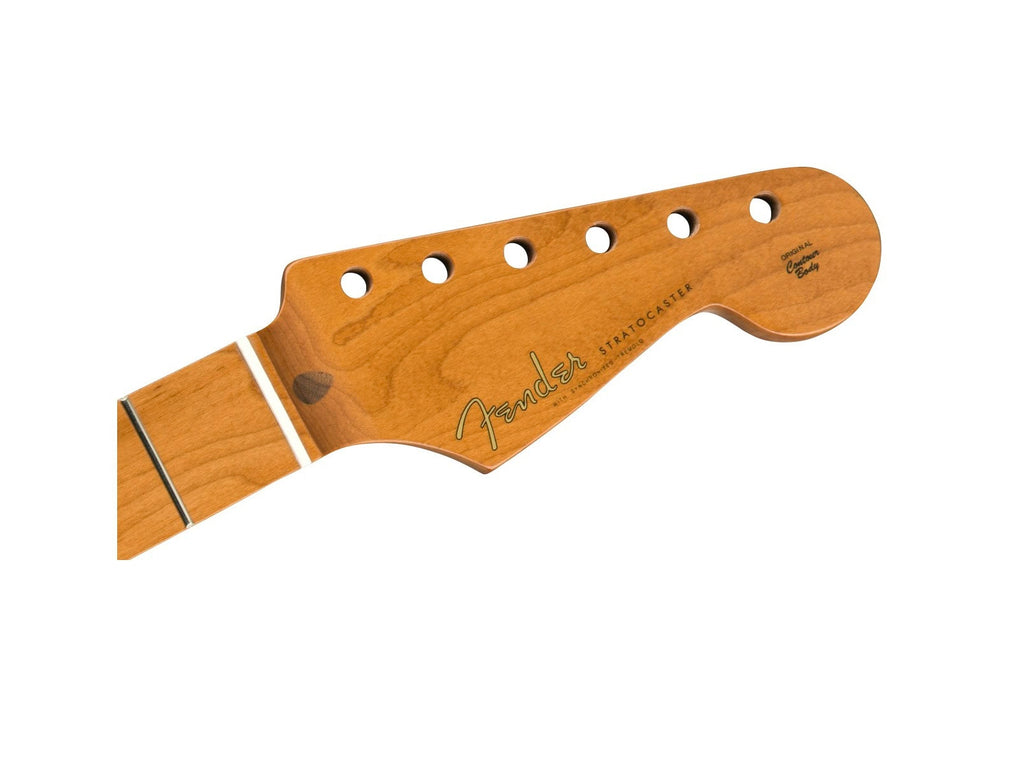 Close-up of a brown wooden Fender Stratocaster guitar neck headstock with six tuning peg holes.