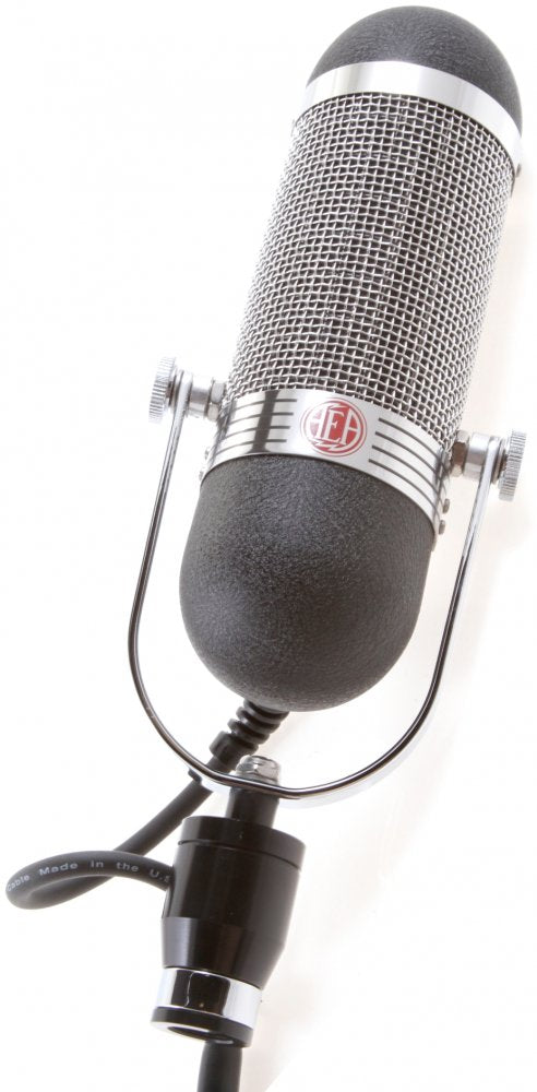 Black and silver microphone with a mesh grille and cable ending in a circular connector and adjustment knobs on the mount.