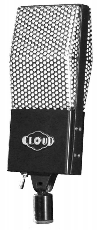 Vintage-style microphone with metal mesh grille and black base labeled LOUD, mounted on a stand connector.