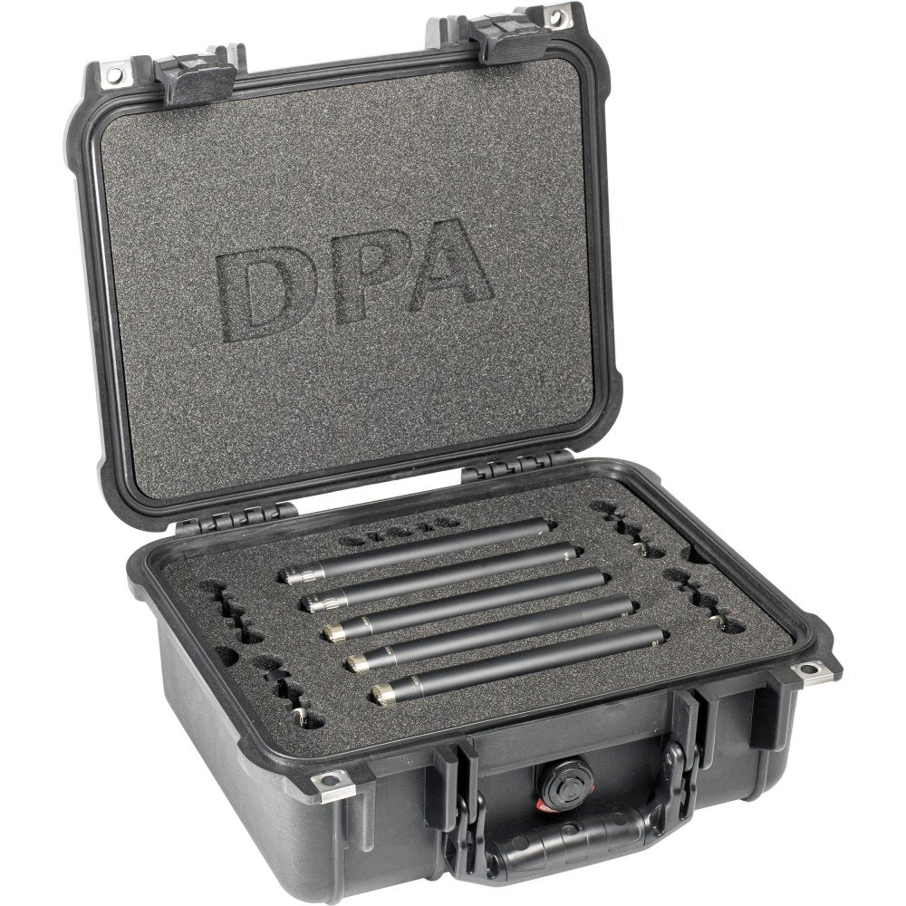 A set of five slim cylindrical DPA condenser microphones with mesh-covered capsule grids, shown with mounting clips and foam windscreens.