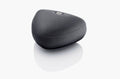 Black triangular microphone with a textured fabric surface and a metallic connector on top on a white background.