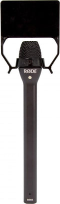 Black handheld microphone with rectangular black pop filter and visible RØDE logo on body and mount.