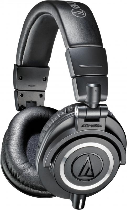 Black over-ear headphones with padded headband and circular ear cups labeled ATH-M50x.
