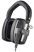 Black and gray over-ear headphones with padded headband and rectangular ear cups showing a wired cable and a rotary dial.