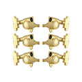 Set of six gold guitar tuning pegs arranged in two rows of three on each side.