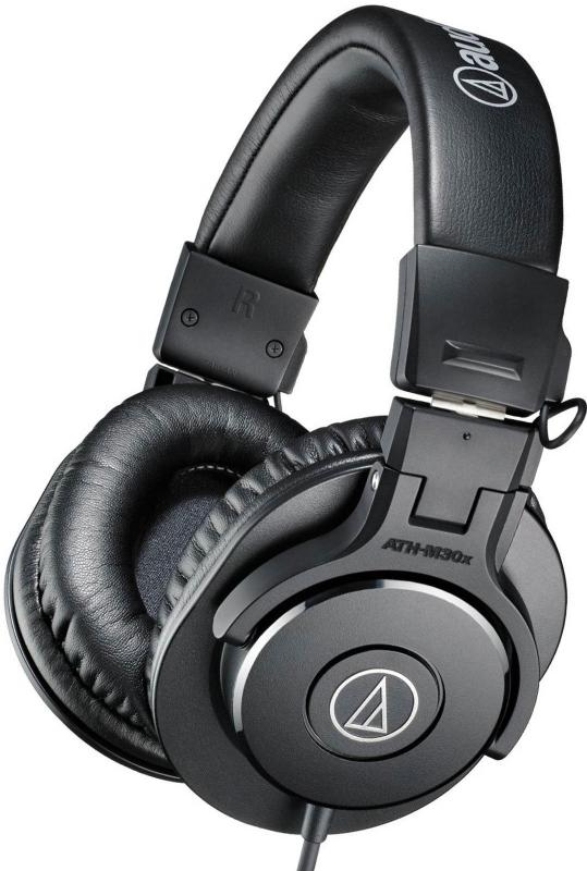 Black over-ear headphones with padded headband and ear cups, featuring visible audio-technica logo and wired connection cable.