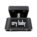 Black wah effect pedal with raised footswitch and white "cry baby" branding on front face.